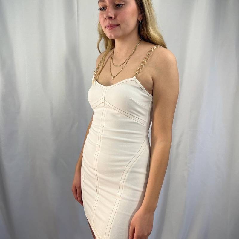 white denim stretch bodycon dress with gold chain shoulder straps
