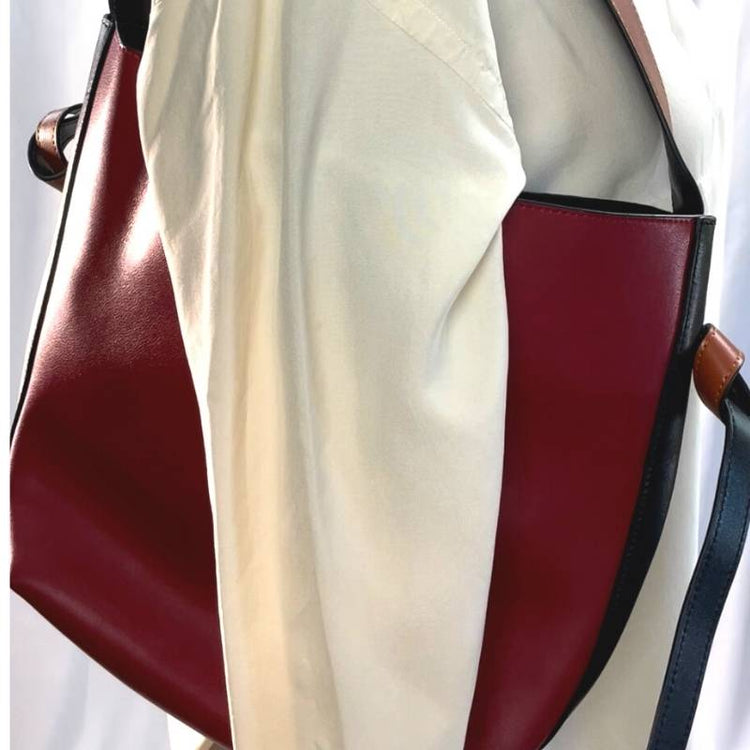 Red black and tan hobo shoulder bag