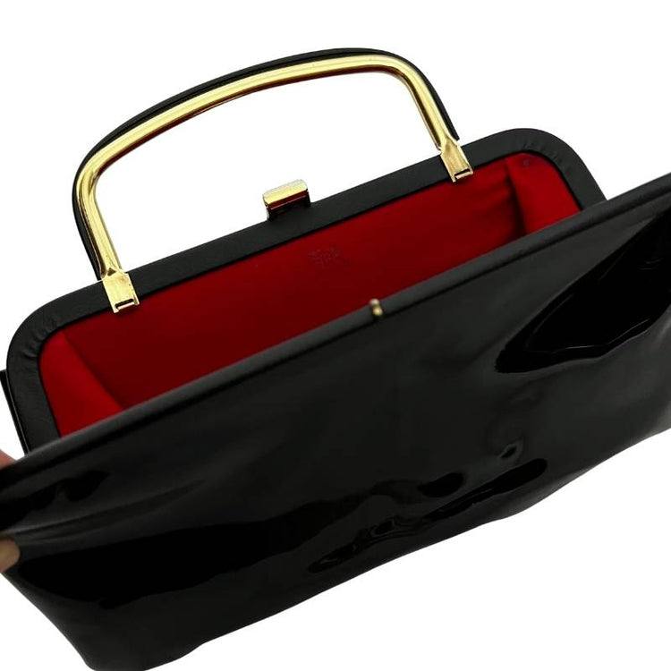 vintage vinyl black clutch gold handle clasp red inside