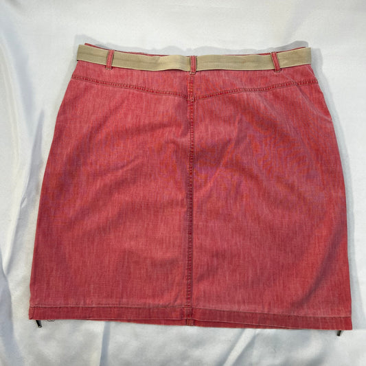 Pre-owned red mini skirt with button and zipper access.  Accent zippers at waist and sides. Belt included.