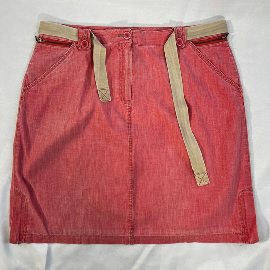Pre-owned red mini skirt with button and zipper access. Accent zippers at waist and sides. Belt included.