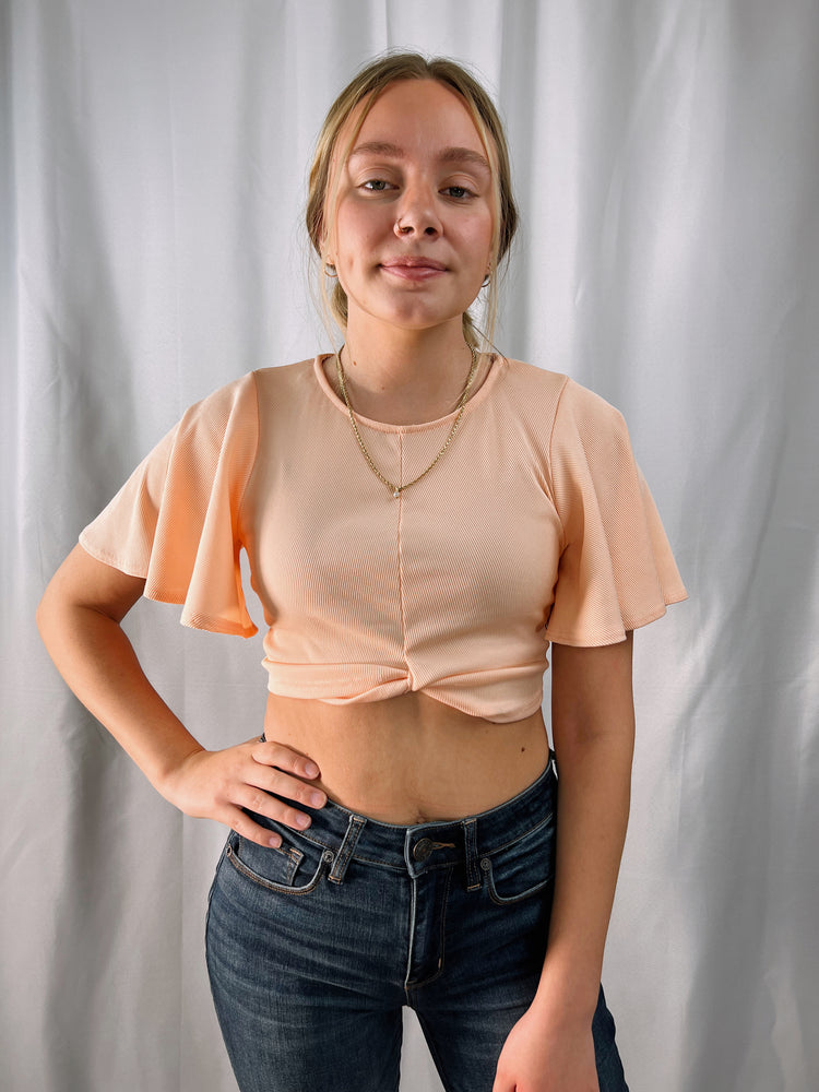 peach crop top flowing short sleeves crew neck