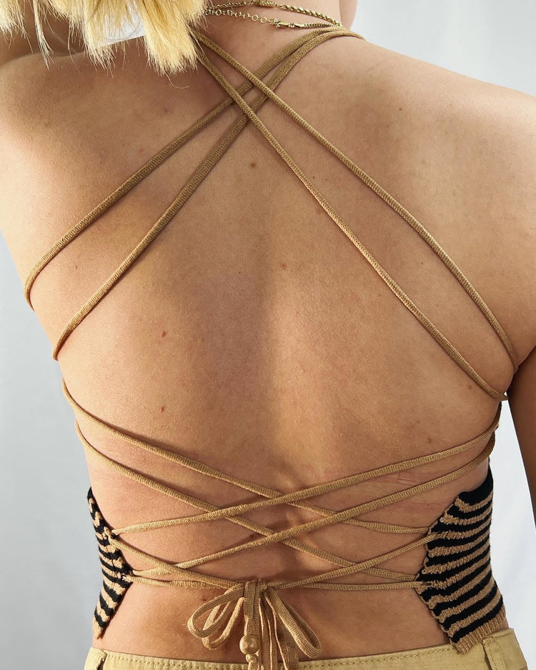 Knit halter cropped with crisscross tie back.