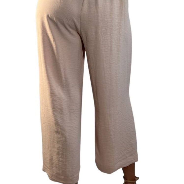 Pink Blush Champagne Wide Leg Pull On Ankle Length Flowing Pants with Pockets and Side Button Detail.