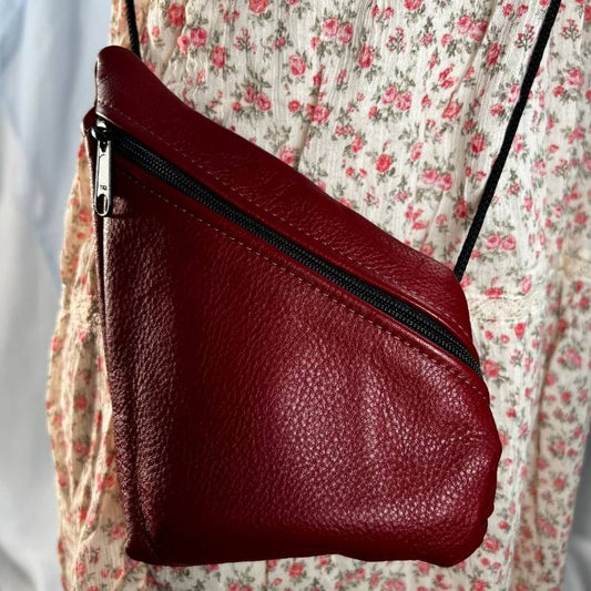 red leather mini crossbody purse angled
