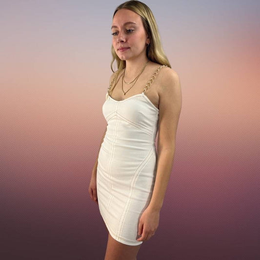 white denim stretch bodycon dress with gold chain shoulder straps